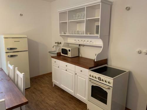 Sz�zesztend?s R�v�szh�z Apartman
