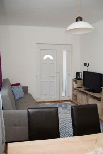 Apartamento Szegf? Vend�gh�z