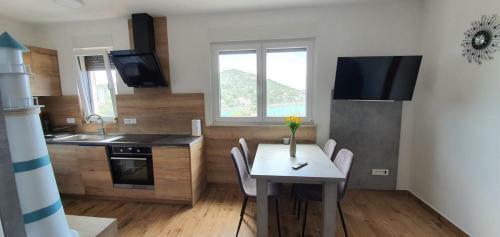Apartmani Tisno Tm