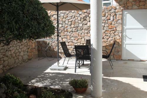 Apartmani "mali Mago"
