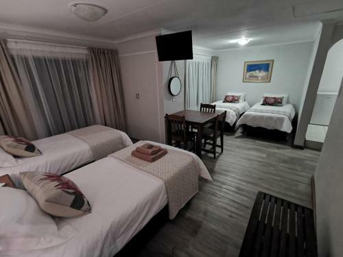 Hostal Rooihuis Lodge