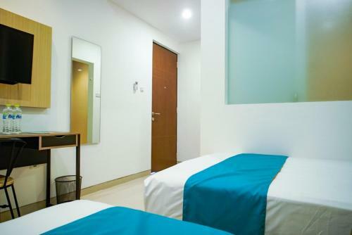 Sans Hotel Box Mansion Surabaya