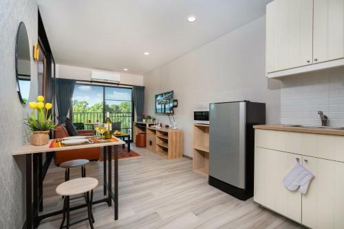 Apartamento The Beachcomber @ Naiyang Beach