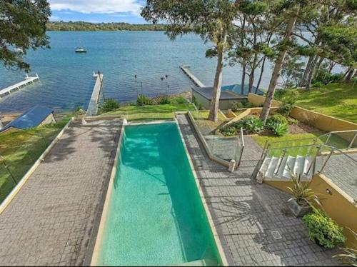 Luxurious Waterfront With Jetty And Boatshed