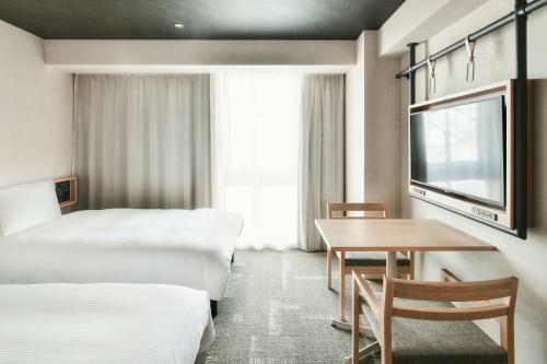 Ref Matsuyama City Station By Vessel Hotels