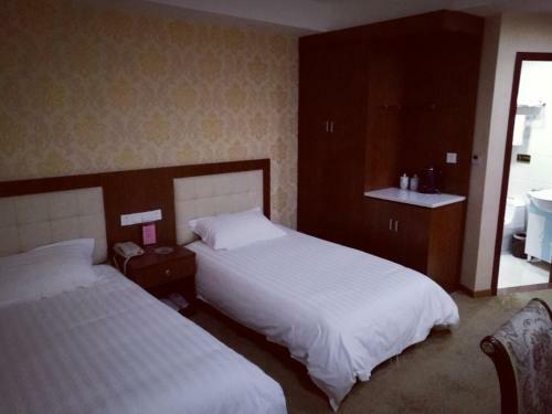 Gloria Plaza Hotel Hangtou