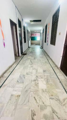 Apartamento Oyo 86599 The Signature Hotel