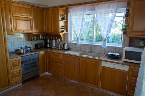 Athenian Riviera Family House