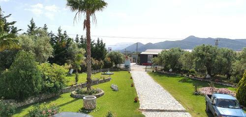 Apartamento Palairos: Rose Garden Experience (A/c, Wi-fi, Bbq)