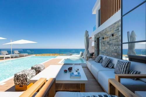 Wave Villa, Beach Front Retreat!