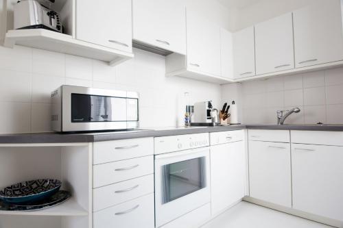 The Flats Apartments - Opera | Contactless Check-in