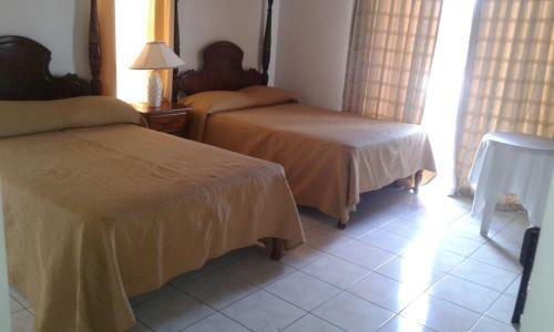 Hotel Whispering Bamboo Cove Resort