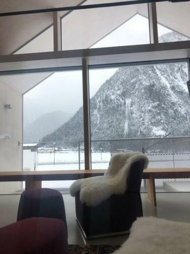 Urban Alpine Penthouse With Lake View