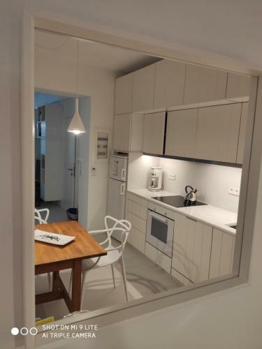 White Cycladic Town House With Sea Vew