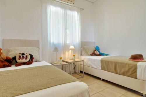 Tagoo Beach House