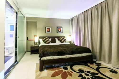 Red Mango Hotel And Apartments