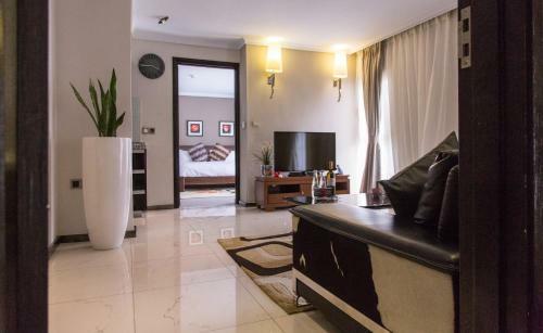 Red Mango Hotel And Apartments