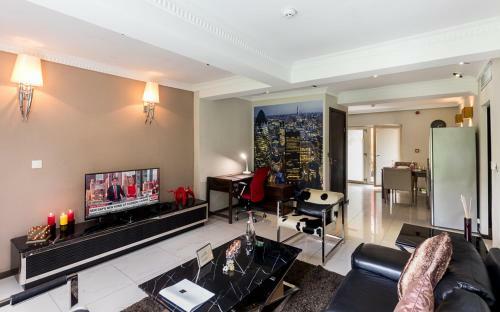 Red Mango Hotel And Apartments