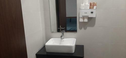 Oyo 1161 Puchin Hotel And Apartment
