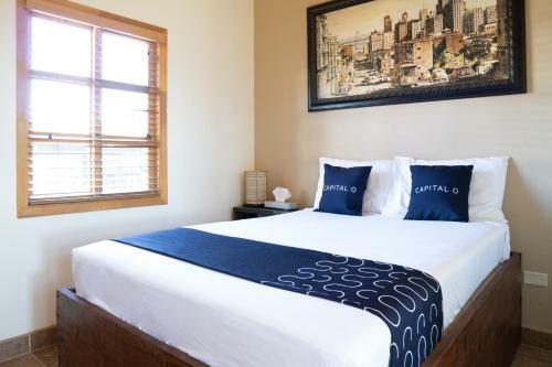 Capital O Hotel Villa Azura
