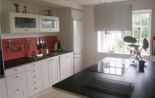 Four-bedroom Holiday Home In Beddingestrand