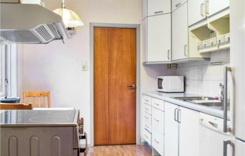 Awesome Home In Fitjar With Wifi And 4 Bedrooms