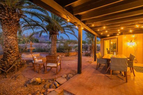 Enjoy A Backyard Botanical Garden And Heated Waterfall Spa