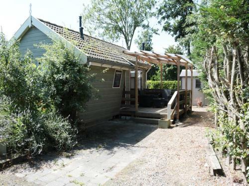 Attractive Chalet With Covered Terrace, In Friesland