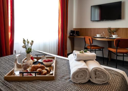 Apartamento �l�gant Studio � C�t� Du Parlement * Guestready *