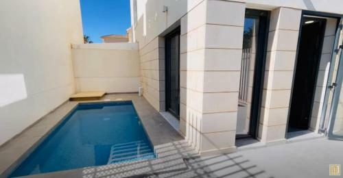 Beach House In Torre De La Horadada With Pool