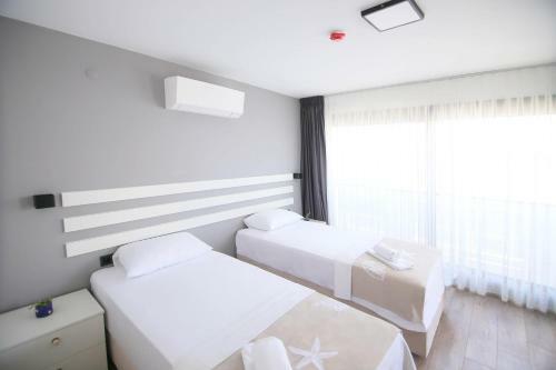 Apartamento Krem Marin Suites