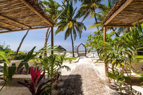 Kima Serviced Beach House & Suites
