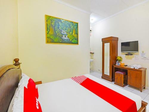 Hotel Capital O 91406 Agus Jaya Residence