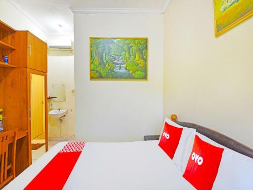 Hotel Capital O 91406 Agus Jaya Residence