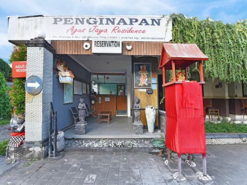 Hotel Capital O 91406 Agus Jaya Residence