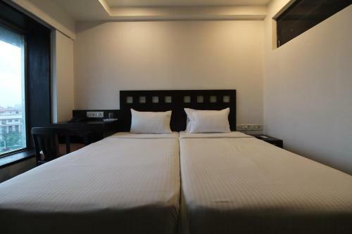 Quaint Suites Hotel & Banquet