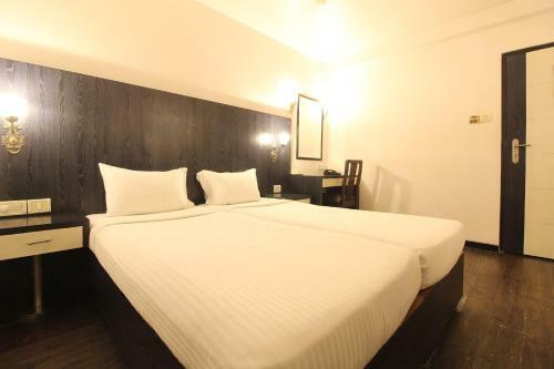 Quaint Suites Hotel & Banquet