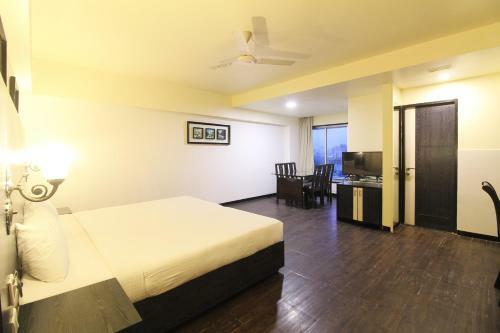Quaint Suites Hotel & Banquet