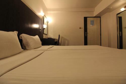 Quaint Suites Hotel & Banquet