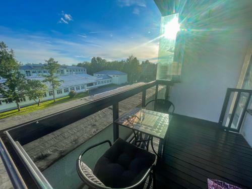 Beach Side Apartment With A Balcony