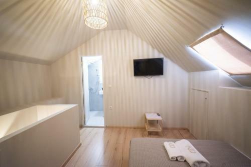 Apartamento Theros Suites