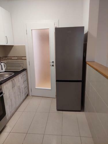 City Passage Apartments- Rooms
