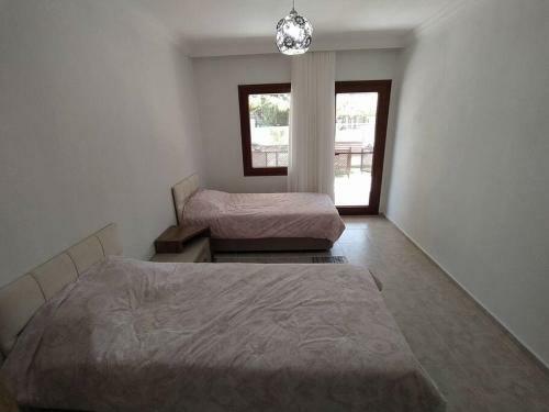 Villa Dat�a �zbel'de Geni? Bah�eli Ferah Ev