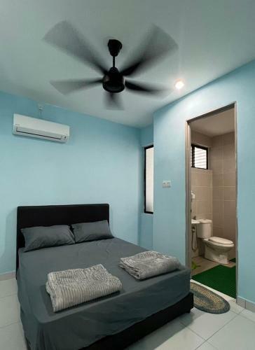 Apartamento Faiz Homestay