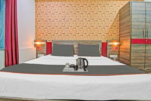 Capital O 91036 Hotel Stanza