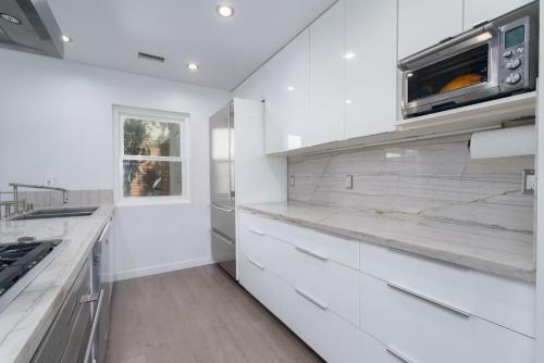 Impeccable Home Walking Distance To The Beach!
