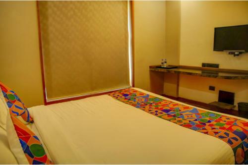 Fabhotel Illam Hospitality