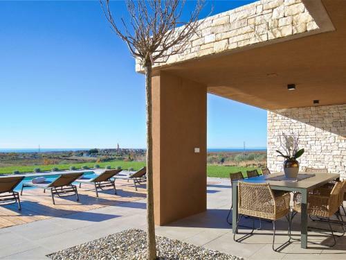 Enticing Holiday Home In Brtonigla With Jacuzzi