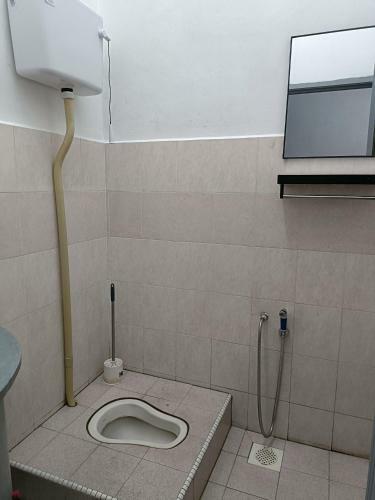 Apartamento Adempuri Homestay