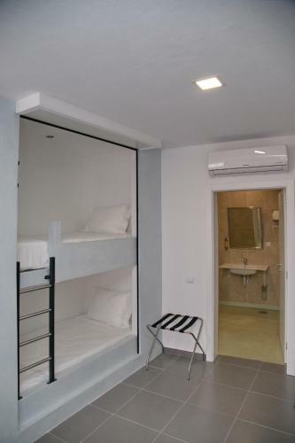 Hostal Ammaia Al